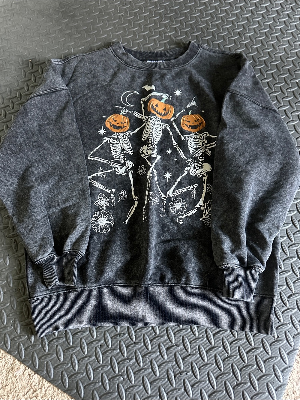 Mighty Fine Black Crewneck Sweatshirt with Orange Pumpkin Skeleton Graphic